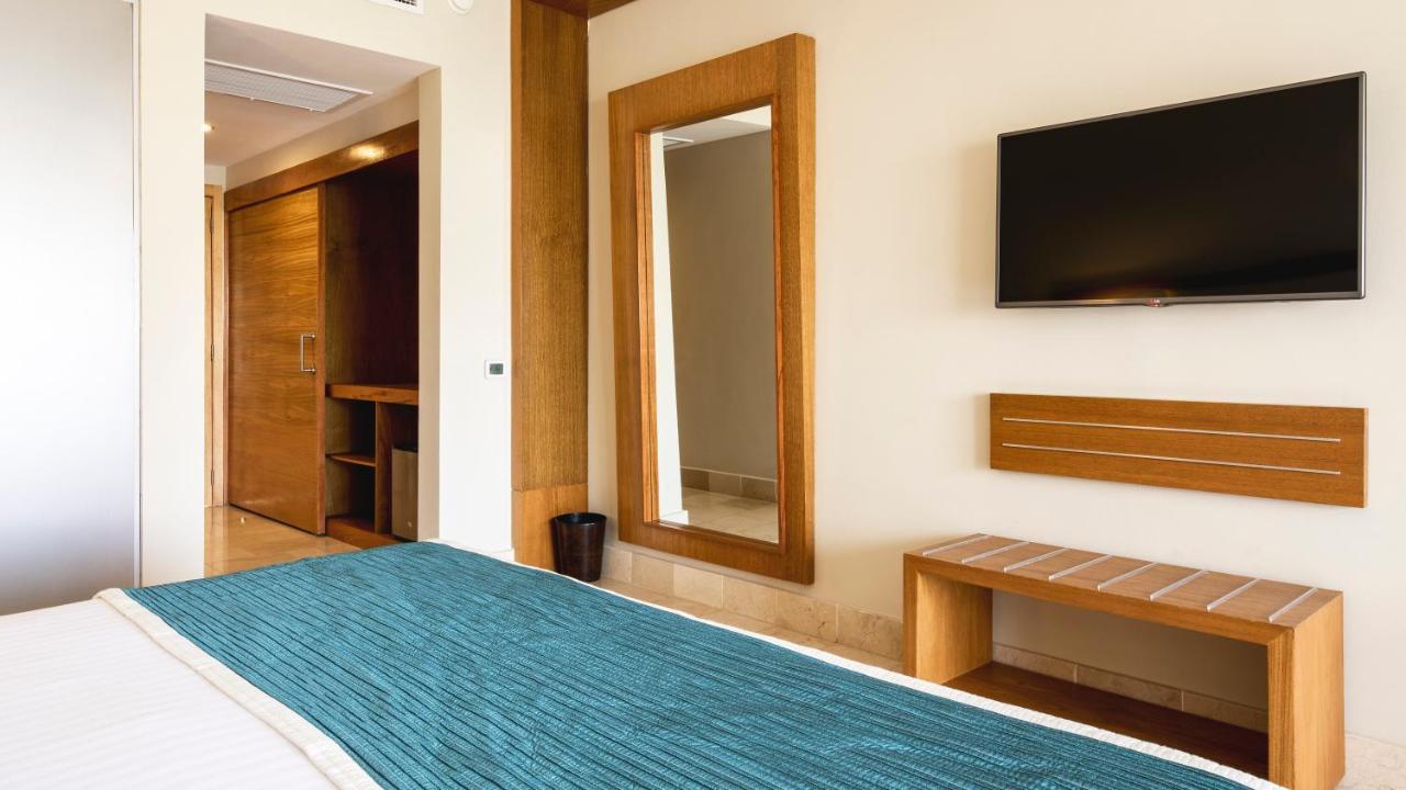 Be Live Collection Canoa Bayahibe Esterno foto A carpet in a hotel room